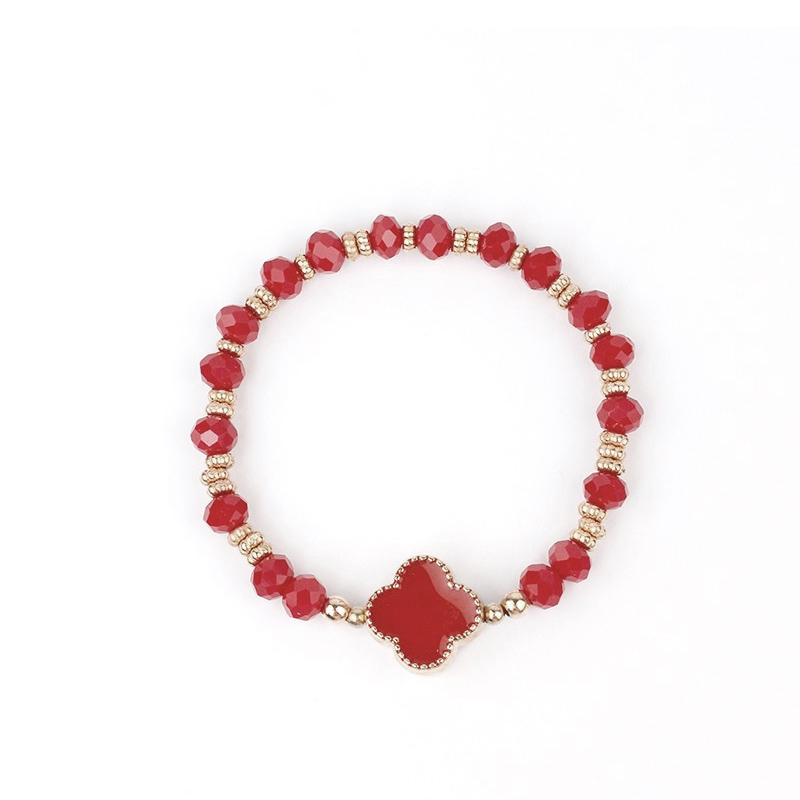 Pulsera Elastica Roja y Dorada con Trebol