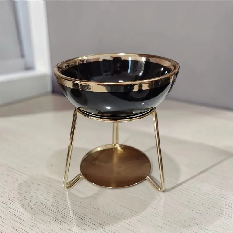 Hornito Negro Pie Metalico Dorado