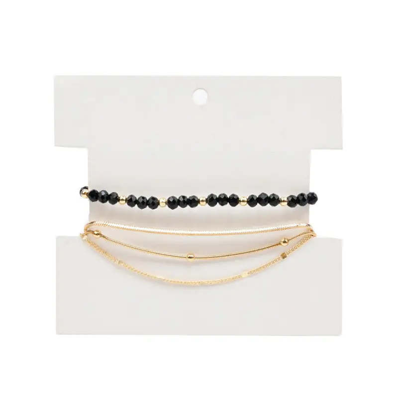 Set Pulseras Cadena Dorada y Elastica Negra