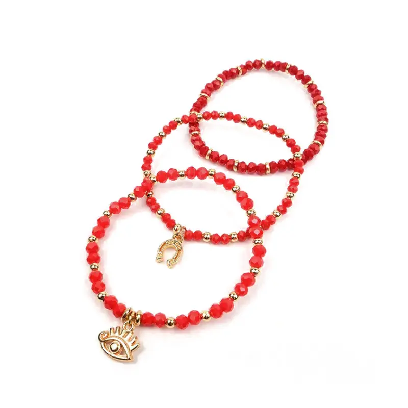Set Tres Pulseras Elasticas Rojas con Dijes Dorados