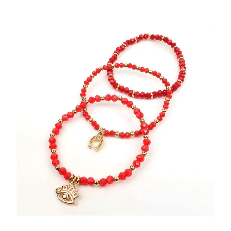 Set Tres Pulseras Elasticas Rojas con Dijes Dorados