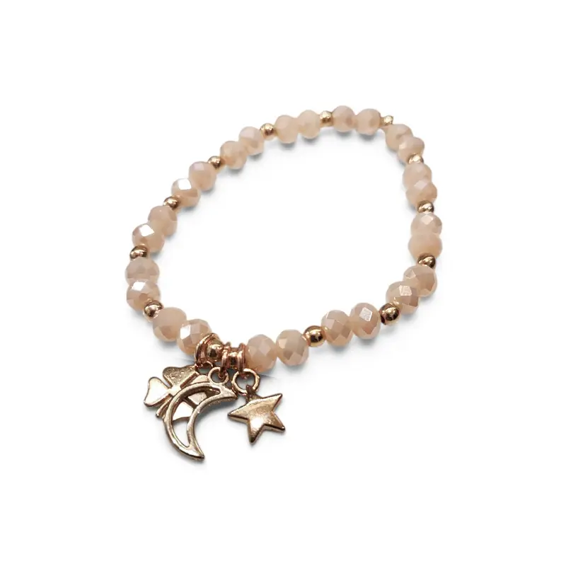 Pulsera Elastica Rosa con Dijes Dorados Luna, Trebol y Estrella 