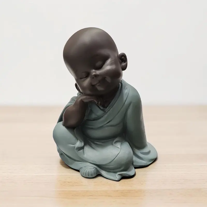 Buda Bebe Negro Reposando Tunica Verde 14cm