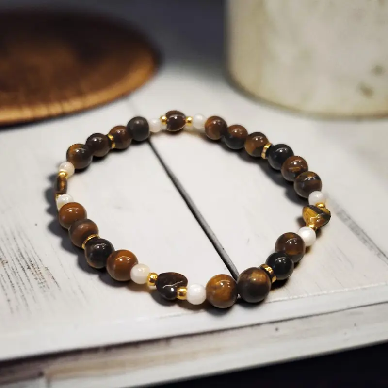 Pulsera Gema Elastica Ojo de Tigre, Hematite Dorado y Nacar