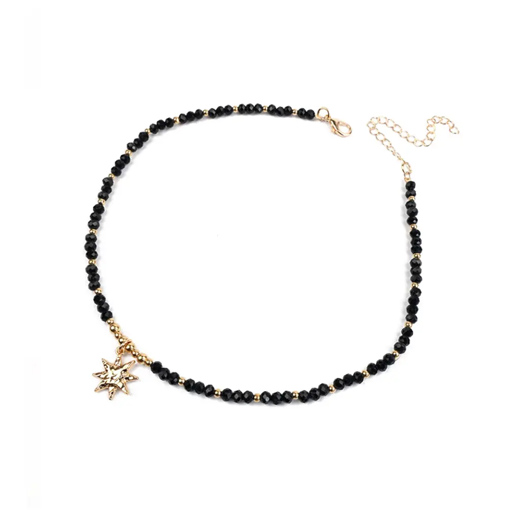 Collar Enhebrado Negro con Dije Sol Dorado