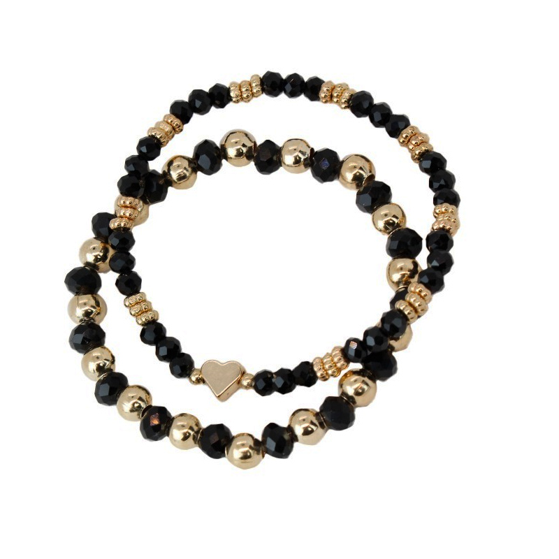 Set Pulseras Elasticas Negras con Corazon Dorado