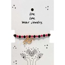 Pulsera Fucsia con Dorado Dijes Corazon y Paz Dorados