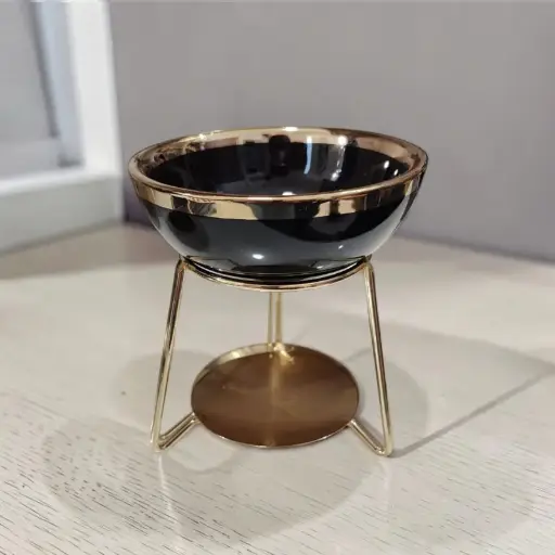 Hornito Negro Pie Metalico Dorado