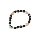 Pulsera Elastica Negra con Corazones y Mariquita Turquesa