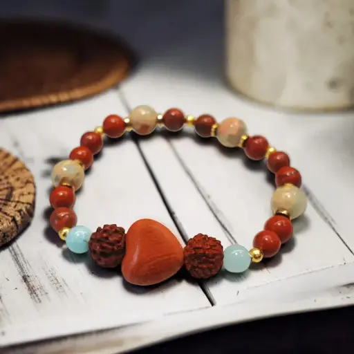 Pulsera Gema Elastica Rudraksha, Larimar, Hematite Dorado, Esfera y Corazon de Jaspe Rojo