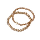 Set Pulseras Elasticas Beige con Corazon Dorado