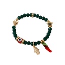 Pulsera Elastica Verde con Ojo Turco, Mano de Fatima y Aji Rojo