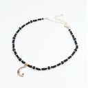 Collar Negro Dije Luna con Estrella Dorada